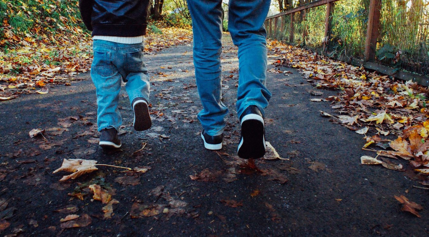 Dad walking with child